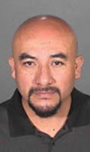 Ronnie Lee Roman appears in booking photo released by LAPD on May 20, 2015.