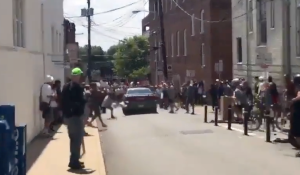 A vehicle plows into a crowd of counterprotesters at a white nationalist rally in Charlottesville, Virginia, on Aug. 12, 2017. (Credit: Brennan Gilmore / @brennanmgilmore via Twitter)