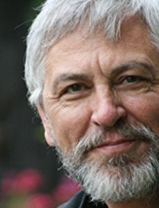 John Slade is seen in a photo from his IMDb page.