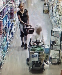 A woman who allegedly stole another woman's purse at a Burbank Ralphs is shown in surveillance video released by Burbank police on Sept. 13, 2017.