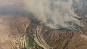 Smoke billows from the Canyon Fire near the 91 Freeway in the Anaheim area on Sept. 25, 2017.