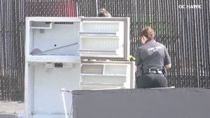 Authorities were investigating after a body was discovered in a fridge left in the middle of a street in Ontario on Sept. 5, 2017. (Credit: OC Hawk)
