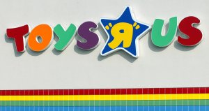 A Toys "R" Us sign is visible at one of its stores January 28, 2002 in Arlington Heights, Illinois. (Credit: Tim Boyle/Getty Images)