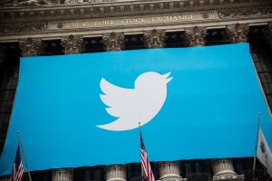 The Twitter logo is displayed on a banner outside the New York Stock Exchange on Nov. 7, 2013, in New York City. (Credit: Andrew Burton/Getty Images)