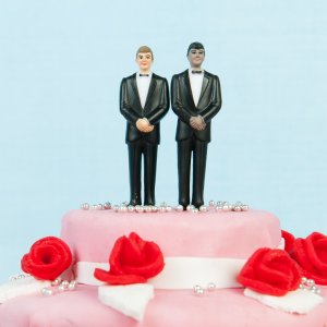 A wedding cake with a gay couple is seen in this file photo. (Credit: iStock / Getty Images Plus)