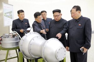 This undated picture released by North Korea's official Korean Central News Agency (KCNA) on Sept. 3, 2017, shows North Korean leader Kim Jong-Un looking at a metal casing at an undisclosed location. (Credit: STR / AFP / Getty Images)