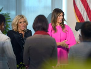 US First Lady Melania Trump (right) and French First Lady Brigitte Macron greet guests at a United Nations luncheon for first spouses of world leaders on September 20, 2017 (Credit: DON EMMERT/AFP/Getty Images)