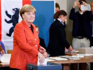 German Chancellor and CDU party leader Angela Merkel casts her vote at a polling station on Sept. 24, 2017, in Berlin. (Credit: ODD ANDERSEN/AFP/Getty Images)