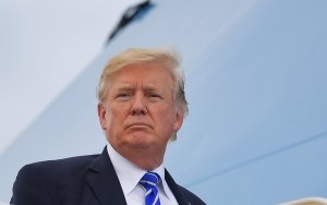 President Donald Trump boards Air Force One before departing from Andrews Air Force Base in Maryland on Sept. 26, 2017. (Credit: Mandel Ngan / AFP / Getty Images)