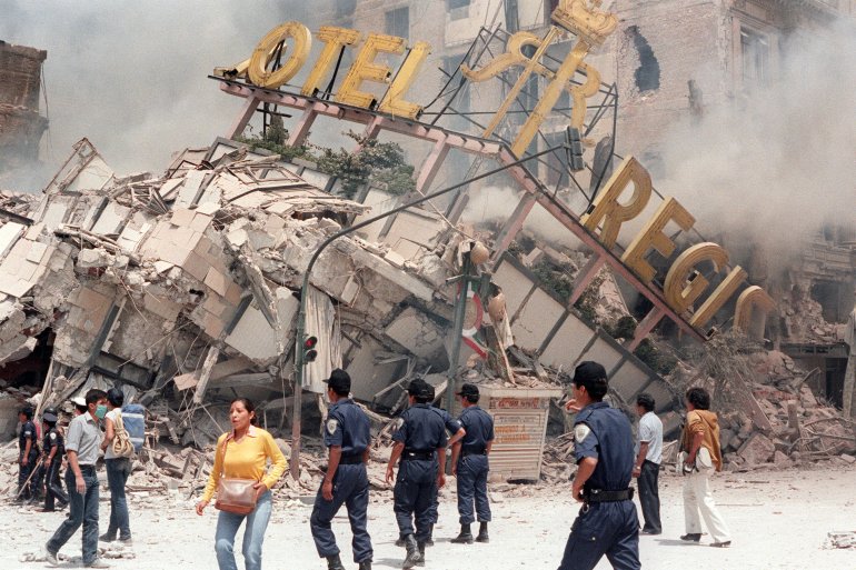 A photo taken Sept. 21, 1985, shows the ruins of Hotel Regis, flattened in the Sept. 19 earthquake that struck Mexico City. (Credit: Derrick Ceyrac / AFP / Getty Images)