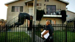 LAPD officers serving gang injunctions are shown in this undated photo. (Credit: (Rick Loomis / Los Angeles Times)