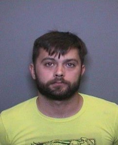Justin German is shown in a booking photo distributed by the Fountain Valley Police Department on Sept. 14. 2017.