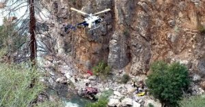 Officials executed a recovery operation on Sept. 1, 2017, to extract two bodies from a 2016 Hyundai Sonata that has been stuck against a rock since late July. (Credit: Fresno County Sheriff's Office Search and Rescue)