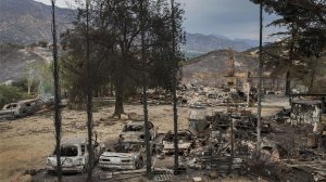 A home, cars and property lies in ruins as it was one of three homes and a shed were destroyed in the La Tuna Canyon fire. (Credit: Allen J. Schaben / Los Angeles Times)