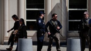 U.S. Marshals stand outside U.S. Federal Court in Brooklyn, New York, during the arraignment on terrorism charges against Muhanad Mahmoud al Farekh, and two Queens women, on April 2, 2015. (Credit: Victor J. Blue/Getty Images)