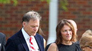 Fred and Cindy Warmbier are seen leaving Wyoming High School in Wyoming, Ohio on June 22, 2017, following the funeral for Otto Warmbier. (Credit: Paul Vernon /AFP/Getty Images)