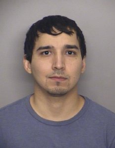 Alexander Pineda, 28, is seen in a booking photo released by the Fontana Police Department on Sept. 26, 2017.