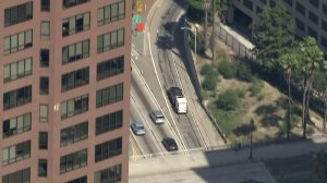 A pursuit driver exits the 110 Freeway in downtown Los Angeles on Sept. 18, 2017. (Credit: Sky5 / KTLA)