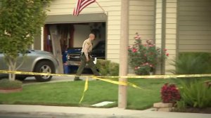 Officials investigate after a man was found dead in Santa Clarita on Sept. 24, 2017. (Credit: KTLA)
