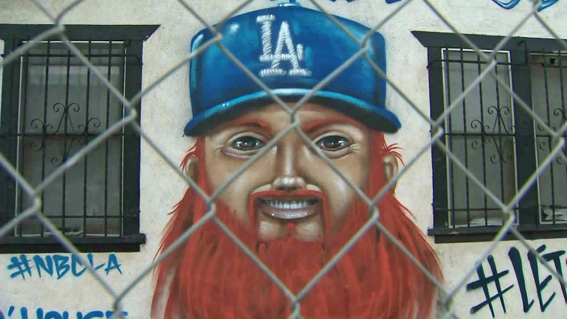 Hector “Tetris” Arias celebrated the Dodgers trip to the World Series by painting a South L.A. home. (Credit: KTLA)