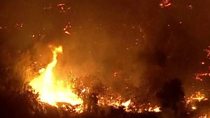 The Canyon Fire 2 in Orange County is seen burning through the area on Oct. 9, 2017. (Credit: KTLA)