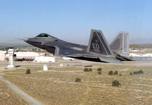 A U.S. Air Force F-22 Raptor flies low over Edwards Air Force Base in Kern County on Oct. 24, 2003. (Credit: Brooke Davis/U.S. Air Force via Getty Images)