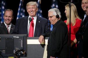 Rick Gates, second from left, and Paul Manfort flank Donald Trump at the Republican National Convention as the then-Republican nominee tests hee teleprompters and microphones on stage on July 21, 2016, in Cleveland, Ohio. (Credit: Chip Somodevilla/Getty Images)