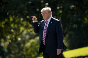President Donald Trump walks toward reporters before boarding Marine One on the South Lawn of the White House on September 29, 2017.(Credit: Drew Angerer/Getty Images)
