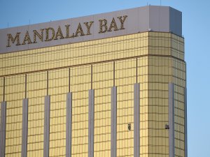 Broken windows are seen on the 32nd floor of the Mandalay Bay Resort and Casino after a lone gunman opened fired on the Route 91 Harvest country music festival on October 2, 2017 in Las Vegas, Nevada. (Credit: David Becker/Getty Images)