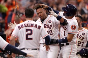 Houston Astros player Yuli Gurriel celebrates after hitting a three-run home run during the fourth inning against the L.A. Dodgers in Game 5 of the 2017 World Series at Minute Maid Park on Oct. 29, 2017 in Houston, Texas. (Credit: Christian Petersen/Getty Images)
