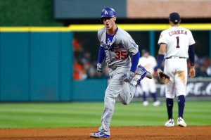Dodgers player Cody Bellinger rounds the bases after hitting a three-run homer during the fifth inning against the Houston Astros in Game 5 of the 2017 World Series at Minute Maid Park on Oct. 29, 2017, in Houston, Texas. (Credit: Jamie Squire/Getty Images)