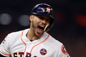 Houston Astros player Carlos Correa reacts after hitting a two-run homer during the seventh inning against the L.A. Dodgers in Game 5 of the 2017 World Series at Minute Maid Park on Oct. 29, 2017, in Houston, Texas. (Credit: Christian Petersen/Getty Images)