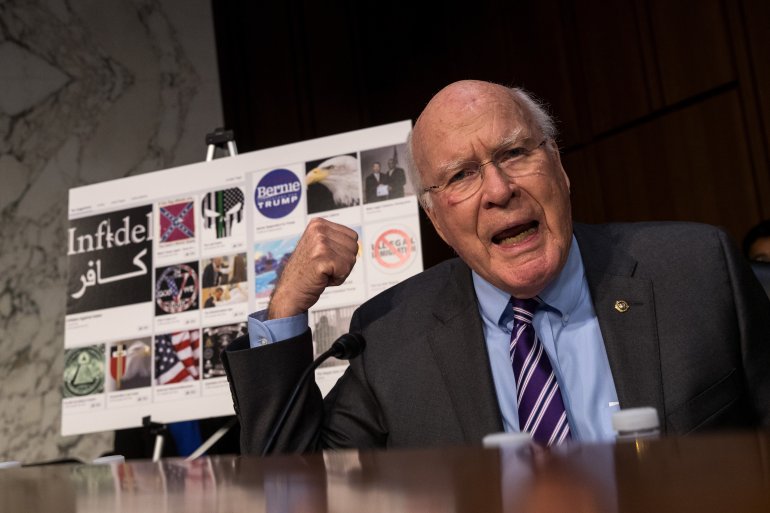 With examples of Russian-created Facebook pages behind him, Sen. Patrick Leahy questions witnesses during a Senate hearing on Russian disinformation online on Oct. 31, 2017. (Credit: Drew Angerer/Getty Images)