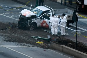 Investigators inspect a truck following a shooting incident in New York on October 31, 2017. (Credit: Don Emmert / AFP / Getty Images)