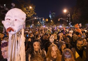 People dressed in costumes take part in the 44rd Annual Halloween Parade in New York City on Oct. 31, 2017. (Credit: Angela Weiss/AFP/Getty Images)