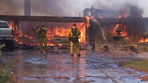 A home along Via El Estribo in Anaheim appears to be destroyed during the Canyon Fire 2 on Oct. 9, 2017. (Credit: KTLA)