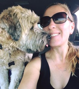 Julia Jacobson and her dog Boogie are seen in a photos posted the Justice for Julia Facebook page.