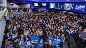 On Oct. 26, 2017, the day after Game 2 of the World Series, JPL baseball fans sport Dodger blue for a quick photo in mission control. (Credit: NASA/JPL-Caltech)