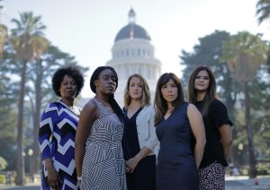 Tina McKinnor, left, Sadalia King, Amy Thoma Tan, Jodi Hicks and Sabrina Lockhart have shared their experiences with sexual harassment in California's Capitol. (Credit: Myung Chun / Los Angeles Times)
