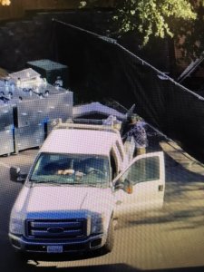 A truck is seen being loaded with goods in a burnt Santa Rosa neighborhood on Oct. 28, 2017. (Credit: Santa Rosa Police Department)