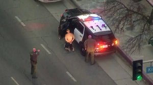 A man is taken into custody after a pursuit in a stolen Sheriff's Department vehicle on Oct. 31, 2017. (Credit: KTLA)