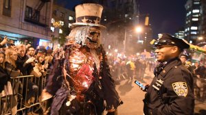 People dressed in costumes take part in the 44rd Annual Halloween Parade in New York City on Oct. 31, 2017. (Credit: Angela Weiss/AFP/Getty Images)