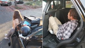 Looting suspects Christina Marsh, left, sits on the hood of a police car, and Sean Kranyak is loaded into the back of a patrol cruiser as they were being detained on Oct. 28, 2017, in Santa Rosa. (Credit: Santa Rosa Police Department)