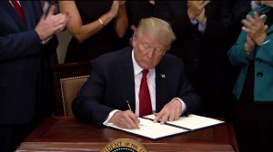 President Trump signed an executive order on health care at the White House on Oct. 12, 2017. (Credit: Pool)