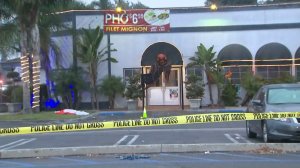The scene of a fatal shooting in Westminster is cordoned off on Oct. 28, 2017. (Credit: KTLA)