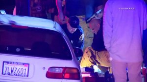 Emergency crews respond to a shooting in Bellflower on Nov. 13, 2017. (Credit: Loudlabs)