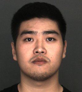 Enping Qu is shown in a booking photo released by the San Bernardino County Sheriff's Department on Nov. 8, 2017.