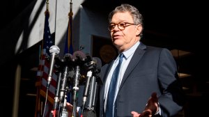 U.S. Senator Al Franken, Democrat of Minnesota, speaks outside his office on Capitol Hill in Washington, DC, on November 27, 2017. (Credit: Jim Watson/AFP/Getty Images)