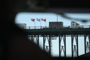 Freight crosses the Peace Bridge over the Niagara River forming the U.S.-Canada border on June 3, 2013, in Buffalo, New York. (Credit: John Moore / Getty Images)