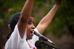 Diamond Reynolds, girlfriend of Philando Castile, speaks to a crowd outside of J. J. Hill Montessori School during a memorial on July 7, 2016, in St. Paul, Minnesota. (Credit: Stephen Maturen / Getty Images)